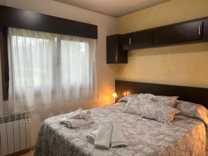 Postel nebo postele na pokoji v ubytování EL HOGARIN DE ARRIONDAS
