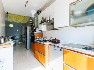 Η κουζίνα ή μικρή κουζίνα στο Apartment CaLella by Interhome
