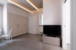 TV a/nebo společenská místnost v ubytování Amas Loft Miccolis