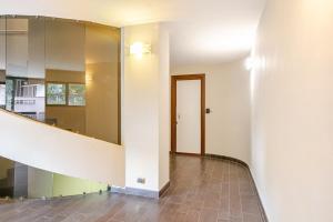 an empty room with a staircase and a hallway at La Piccola Luxury Suite in Rome +10 photos