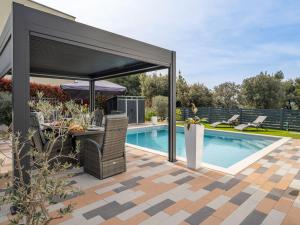 Πισίνα στο ή κοντά στο Holiday Home Giny by Interhome