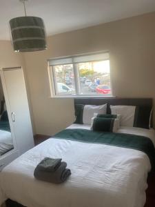 Postel nebo postele na pokoji v ubytování Rooms with Cont Breakfast Galway City + 37 fotografií