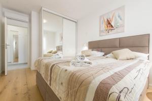 Ένα ή περισσότερα κρεβάτια σε δωμάτιο στο Luxury apartment Mata