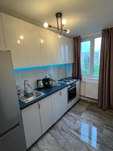 Køkken eller tekøkken på CX Family Apartment