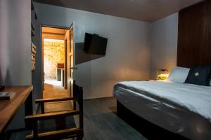 Postel nebo postele na pokoji v ubytování Bungalows Demetria