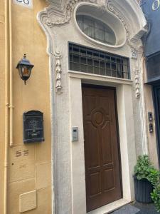 The facade or entrance of Piazza di Spagna Apartment