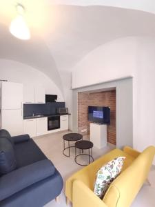 Μια τηλεόραση ή/και κέντρο ψυχαγωγίας στο Charmant T2 cosy avec sauna privé & cour en plein cœur de la ville
