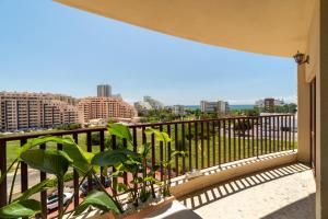 a balcony with a view of a city at Sea Breeze in Portimão