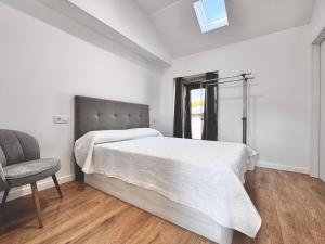 Albergue Turistico En Armenteira A Fragua do Ferreiro客房内的一张或多张床位