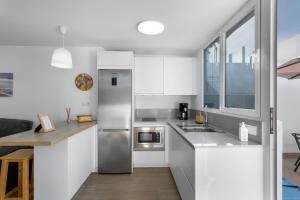 Una cocina o zona de cocina en ENEXO BEACH HOUSE