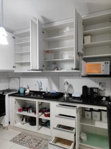 Kuchyň nebo kuchyňský kout v ubytování Praia do Massaguaçu - Casa Lassiter