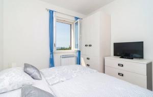 Postel nebo postele na pokoji v ubytování Villa San Nicolo