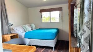 Letto o letti in una camera di A Piece of Paradise