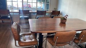 a dining room with a table and chairs at Uotan in Mexico City