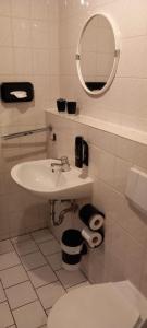 Bilik mandi di HARZ-APPARTEMENT am HEXENSTIEG