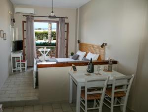 Postel nebo postele na pokoji v ubytování Petros Village - A Private Escape + 10 fotografií