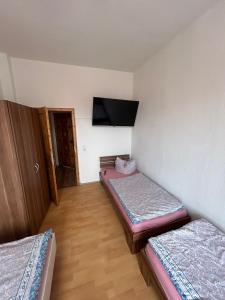 Ένα ή περισσότερα κρεβάτια σε δωμάτιο στο Elbe Quartier Meissen- Wohnung 12 +1 φωτογραφίες