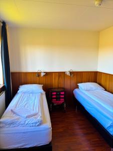 Una cama o camas en una habitación de Brú Country Estate
