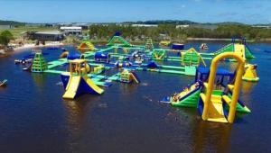 a water park with a bunch of slides in the water at Tiny Comfy flat with Bikes in Coolum Beach