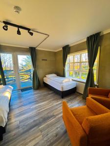 Postel nebo postele na pokoji v ubytování Brú Country Estate + 37 fotografií
