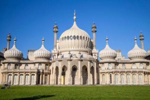 a large white building with domes on top of it at Slice of Brighton With Seaviews By My Getaways in Brighton & Hove