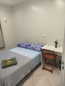 Postel nebo postele na pokoji v ubytování Pousada Central Quarto 2