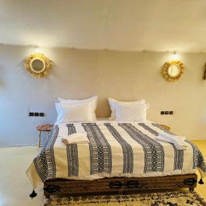 Postel nebo postele na pokoji v ubytování Luxury Trippers Camp