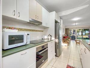 Η κουζίνα ή μικρή κουζίνα στο Paradise Apartments 2