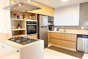 Η κουζίνα ή μικρή κουζίνα στο ASA | Cobertura Duplex | Meia Praia | Hidro | 4QT