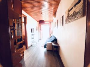 a living room with a couch in a room with at Lisbon Alcantara LX in Lisbon