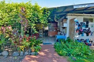 Jardin de l'établissement Pension De La Plage