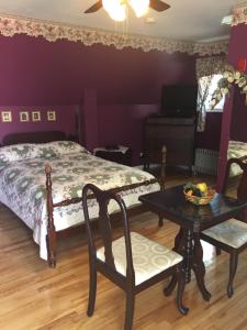 Le Gîte De La Sagouine客房内的一张或多张床位