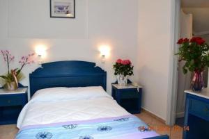Ένα ή περισσότερα κρεβάτια σε δωμάτιο στο Hotel L&S lignos