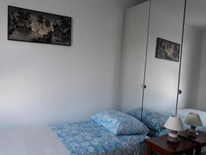 Posteľ alebo postele v izbe v ubytovaní VUE EXCEPTIONNELLE SUR LE LAC