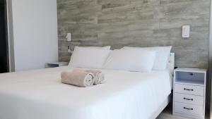 Letto o letti in una camera di One Love Motel
