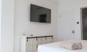 Letto o letti in una camera di One Love Motel