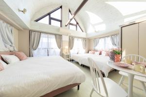 Postel nebo postele na pokoji v ubytování UNITEDCUBE STAY TOKYO Private urban vacation home