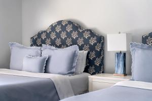 Postel nebo postele na pokoji v ubytování Southampton Inn