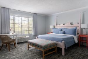 Postel nebo postele na pokoji v ubytování Southampton Inn