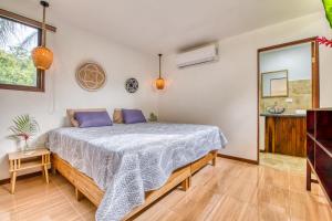 Krevet ili kreveti u jedinici u okviru objekta Beachfront Studio - Direct Beach Access, AC & Fast WiFi