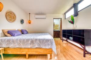 Krevet ili kreveti u jedinici u okviru objekta Beachfront Studio - Direct Beach Access, AC & Fast WiFi