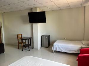 Postel nebo postele na pokoji v ubytování Hospedaje bolognesi