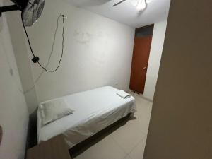 Postel nebo postele na pokoji v ubytování Hospedaje bolognesi