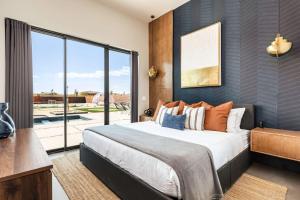 Letto o letti in una camera di Sapphire Serenity