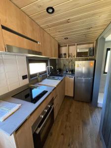 Gambar di galeri bagi Malalcahuello Tiny House di Curacautín