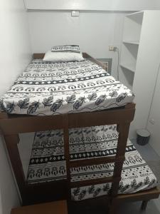 Postel nebo postele na pokoji v ubytování Felipas City Center Budget Room Home Stay