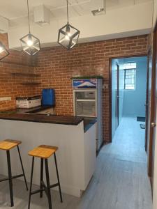 Kuchyň nebo kuchyňský kout v ubytování Felipas City Center Budget Room Home Stay