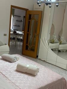 Postel nebo postele na pokoji v ubytování PM 2 Via dei Mille + 1 fotografie