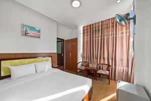 Postel nebo postele na pokoji v ubytování Kis Hotel & Apartment