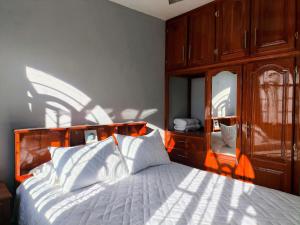 Ένα ή περισσότερα κρεβάτια σε δωμάτιο στο Casa en Villas Universidad Confort